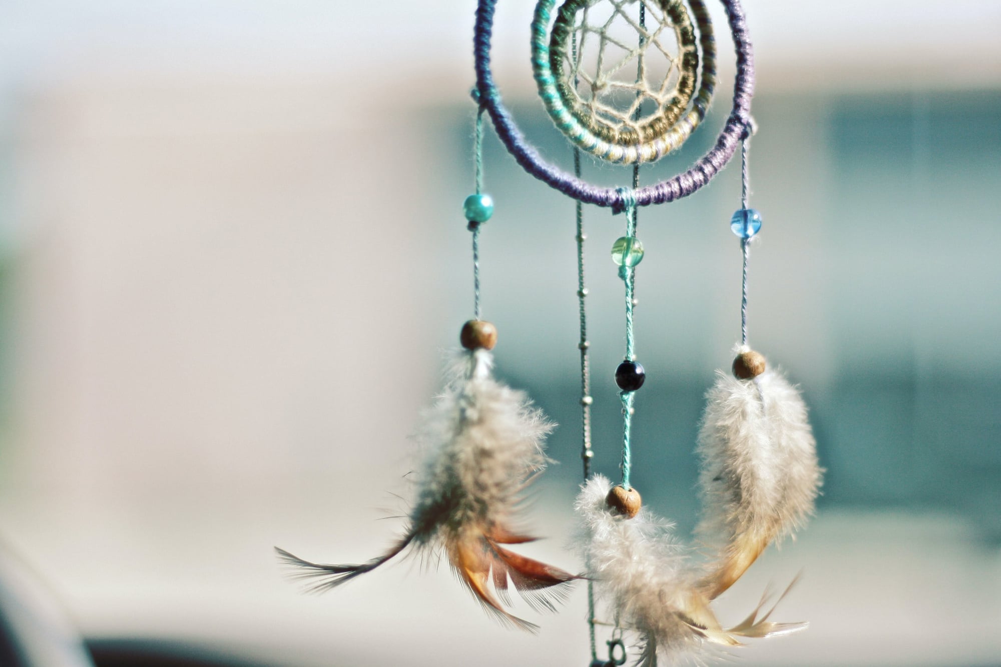 dreamcatcher with beads and feathers
